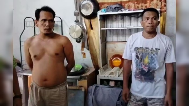 Dua pria diamankan polisi. [Istimewa]